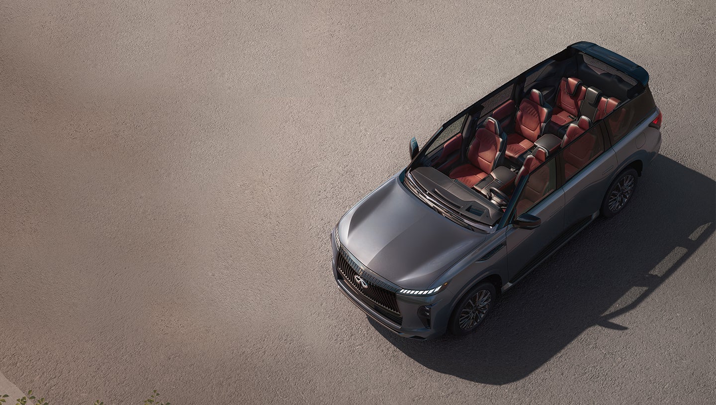 Nuevo INFINITI QX80 Autograph sobre carretera al atardecer